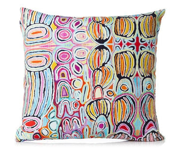 Cushion cover with zip, 45cm x 45cm by Warlukurlangu Artists. Various vivid colours including blue, red, orange, pink, and black, painting by Judy Watson. Made in Australia.