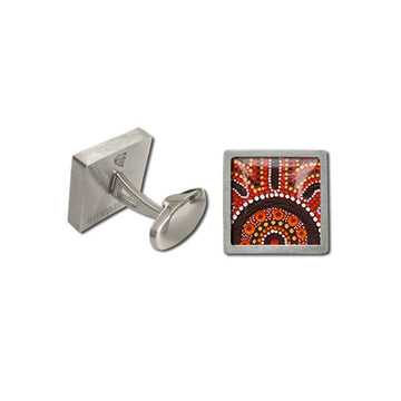 Brushed, square, stainless-steel cufflinks in front and rear view. Features Gathering Bushfood artwork by Kathleen Buzzacott. Red background; brown brush strokes; yellow, orange, and white dot art. Made in Australia.