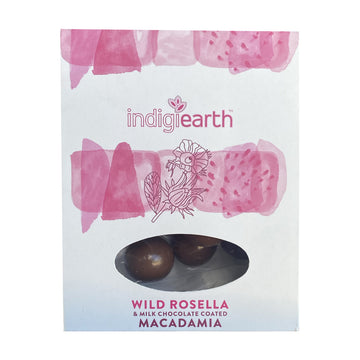 A white packet with pink illustrations and an oval window showing chocolate inside.