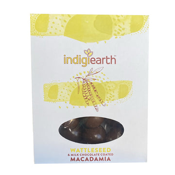 A white packet with yellow illustrations and a oval window showing chocolate inside.