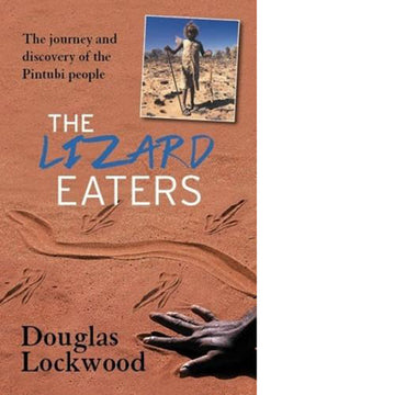 Photo, a hand is making an indent in sand, with line and markings drawn. Inset photo, a person holding a hunted lizard. The lizard eaters, Douglas Lockwood in type.