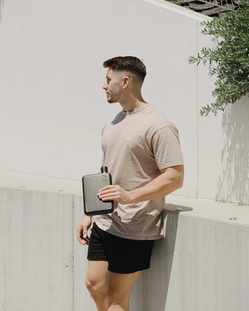 A black stainless steel water bottle in an A5 size.