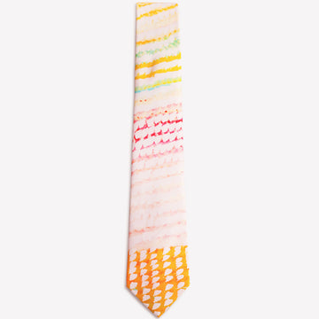 A tie featuring artwork by Bugai Whyoulter in the colours of yellow, pink and red.