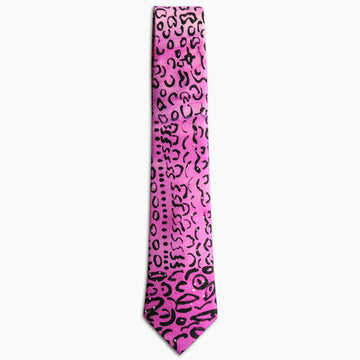 A pink tie with black lines, circles and dots featuring artwork by Helen Dale Samson.