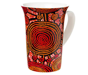Fine Bone China mug, height 12.5cm. Artwork by Teddy Gibson. Red background: red, orange, and black circles joined together by lines; white, orange dot art. White glaze inside. Australian made.
