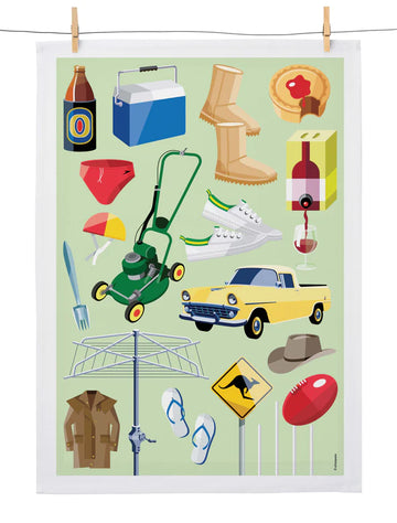 A tea towel printed with illustrations of Australian objects including a clothesline, ugg boots, a meat pie and a lawnmower.