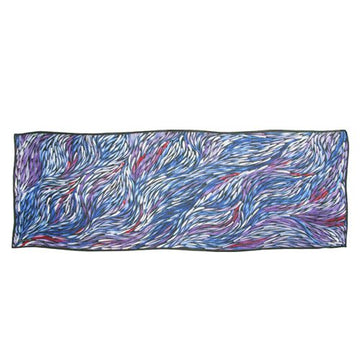 Rectangle Australian made silk chiffon scarf 50cm x 150cm. Black gift-box, red trim, Utopia Dreaming label. Artwork, by Jeannie Petyarre; swirling purple, blue, white, red leaf shapes; black trim.