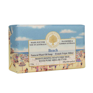 Soap Beach. Off side picture of a soap bar with an image of a beach, people and umbrellas and a blue sky with clouds.