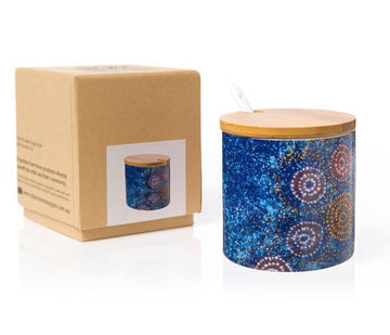Fine bone china cylindrical sugar bowl and spoon with wooden lid. Blue painting by Alma Granites with red, white, and orange dot art circles. Made in Australia cardboard gift box.