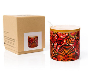 Bone china cylindrical sugar bowl, and spoon with wooden lid. Artwork by Teddy Gibson. Red background: red, orange, and black circles attached by lines; white, orange dot art. Gift box.