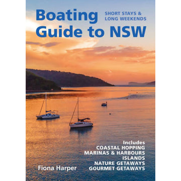 'Boating Guide to NSW' book cover featuring a photo of two boats in the water at sunset with mountains in the background.