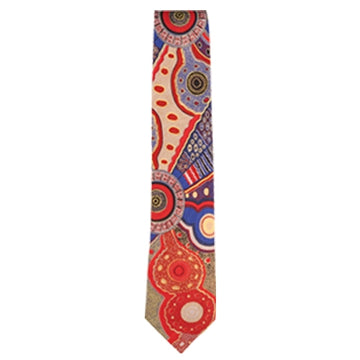 Tie featuring artwork by Norman Cox with a circular design in red and blue.