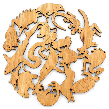 A large wooden trivet featuring a series of Australian animals cut out and just touching each other. The animals feature a koala, emu, wombat and turtle.