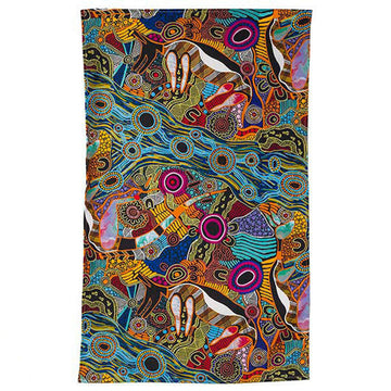 A tea towel laid out flat featuring artwork by Justin Butler in green, blue, orange and brown.