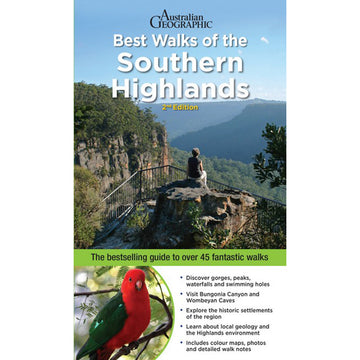 'Best Walks of the Southern Highlands' book cover featuring a photo of a person sitting on a large tree stump at the top of a mountain.