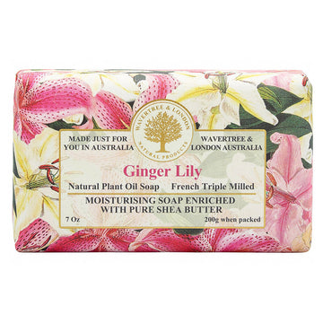 Packaged bar of soap in floral creams, greens and pinks with a clear image of "Ginger Lilly" written in pink text and also text in black.